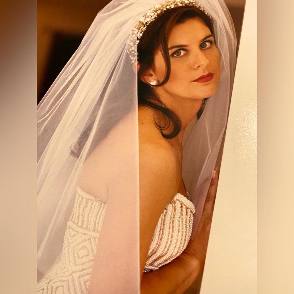 Stunning one of a kind handmade and hand beaded wedding dress. Prof Preserved